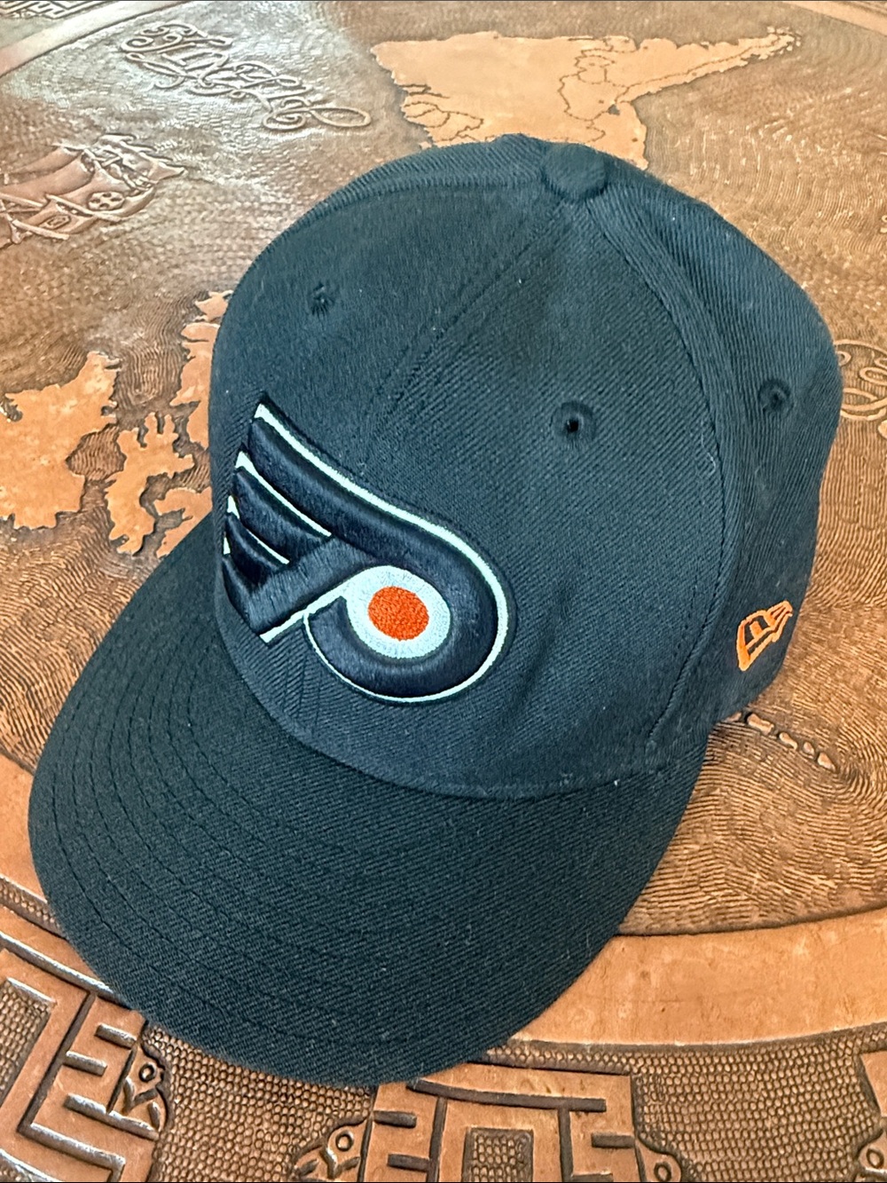 Philadelphia Flyers Hockey New Era Black Cap w/Orange/White Hockey Logo. Size 7.